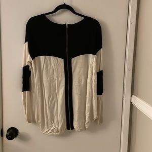 Black and white sweater, zip up back. Soft, not itchy!